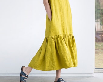 Drop ruffle maxi linen dress. Washed and soft linen dress in greenish mustard
