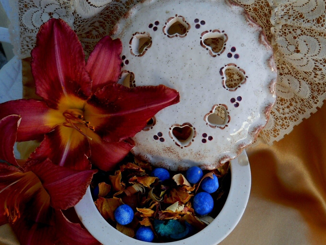 Ceramic pie shaped potpourri dish ,with heart shaped openings to