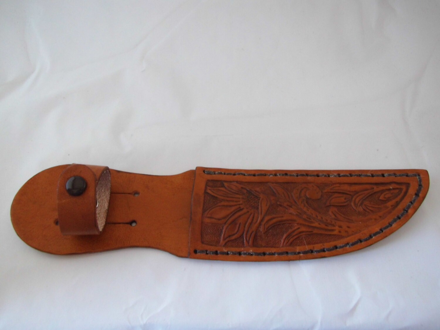 Small hand tooled leather knife sheath Made in Montana