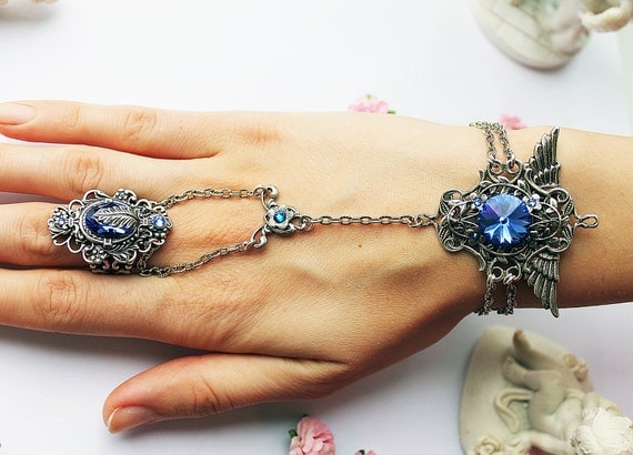 Blue angel wings gothic steampunk fantasy swarovski slave bracelet by DreamCloudJewelry steampunk buy now online Blue angel wings gothic steampunk fantasy swarovski slave bracelet by DreamCloudJewelry steampunk buy now online