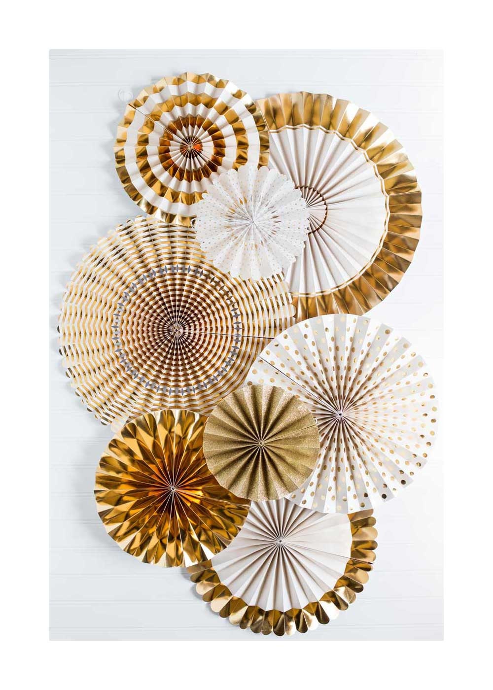 Set of 8 Gold and Ivory Paper Pinwheel Fans. Gold pinwheel.