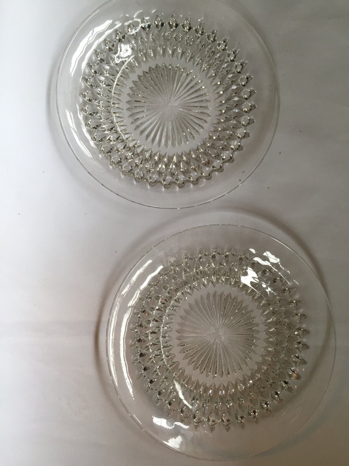 Vintage cut glass plate six inch in diameter. Set of two.