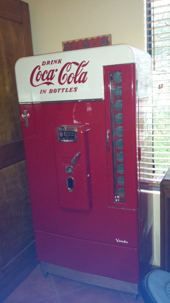 Fully restored CocaCola Vendo 110 soda machine
