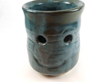 tourmaline green tea candle holder, stoneware glass with face, children's art