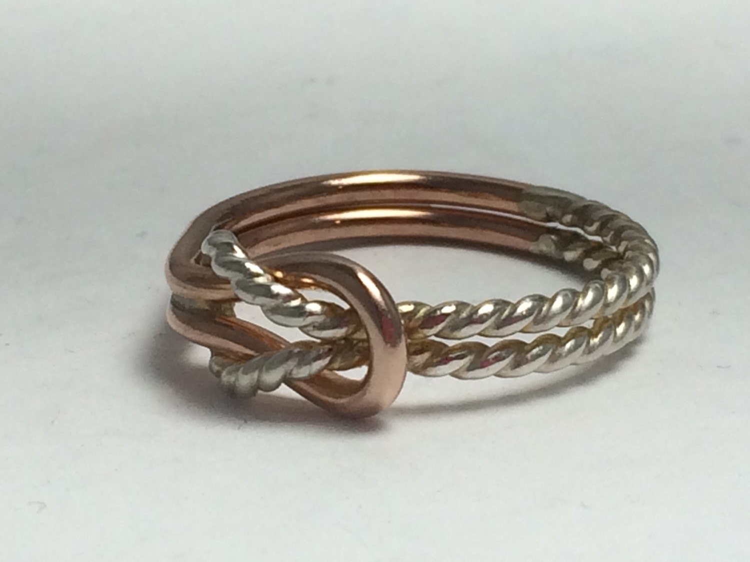 Hercules knot ring two tone buckle rose silver sailors knot