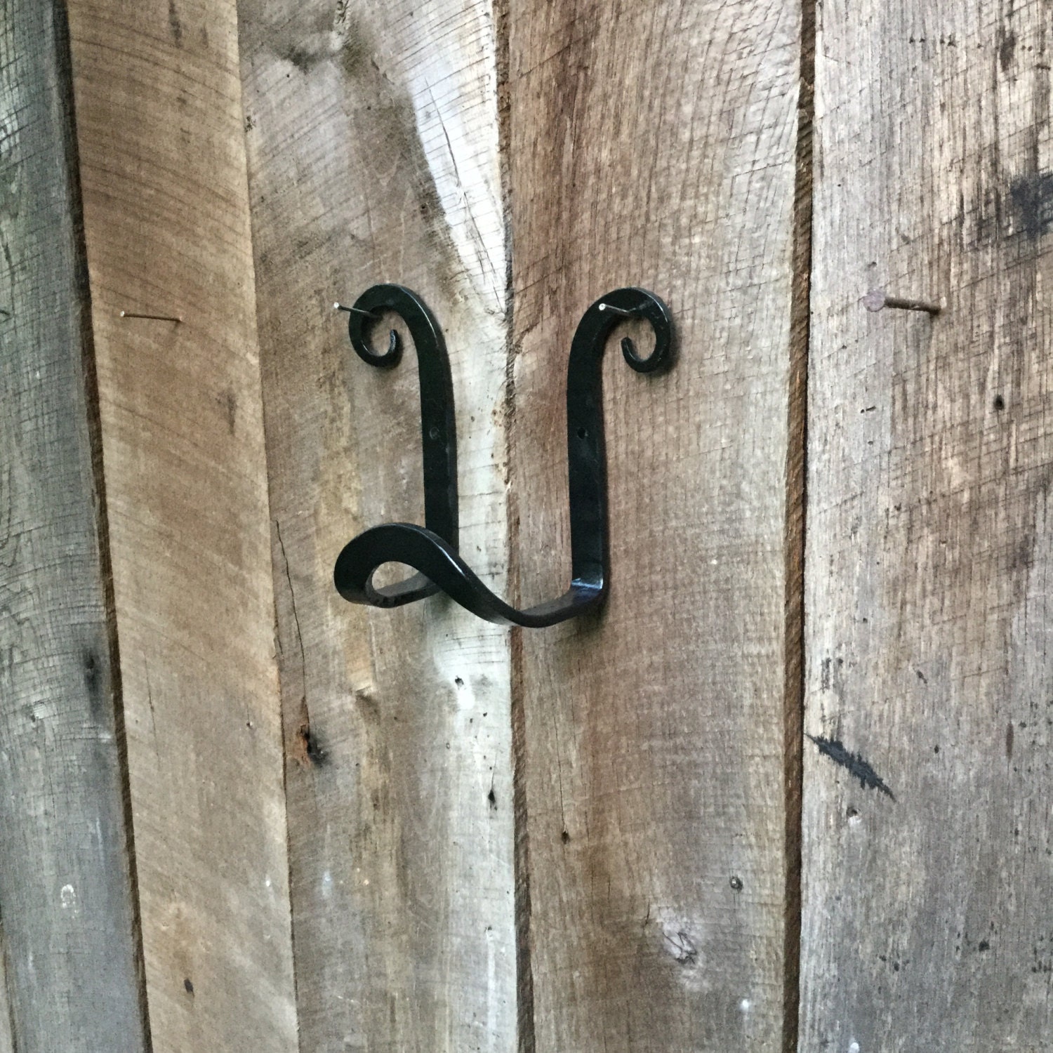 Garden hose hanger hand hook wrought iron scroll