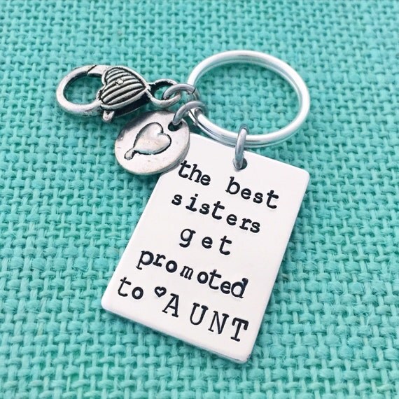 Keychain with clasp and charm The best sisters get promoted