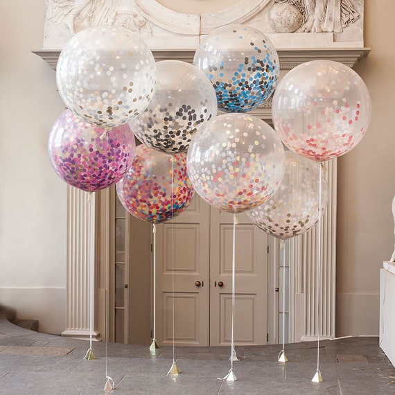 Giant Round Clear Balloons with confetti inside by ThePartyPostman