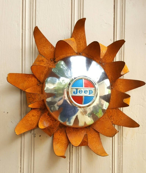 Jeep hubcap sunflower or sun rusted metal wall by MyRustedRoots