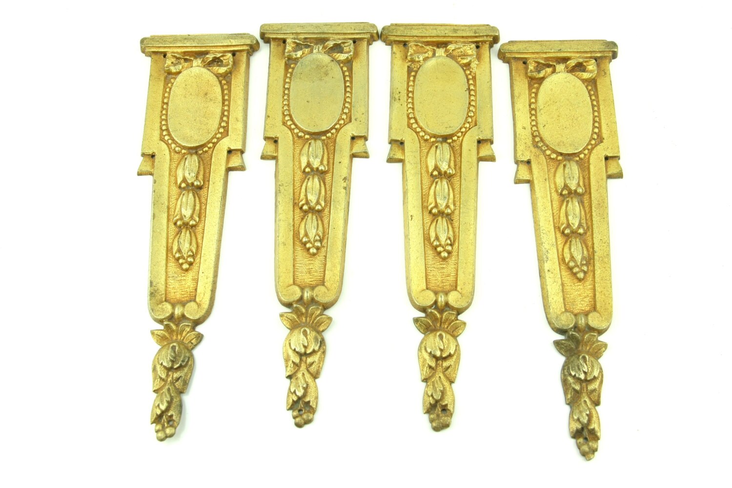 Antique French furniture hardware, with ornates motives. Set of 4 solid