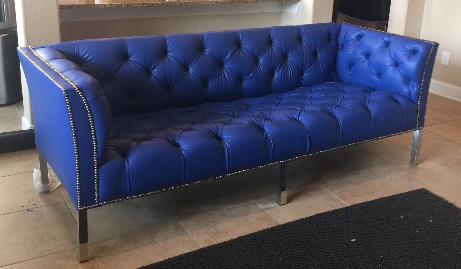 SOLD Custom Tufted Blue Vinyl Sofa with Silver Nailhead Trim