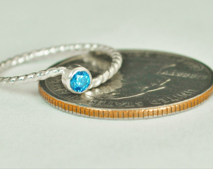 Wave Ring, Silver Wave Ring, Blue Zircon Mothers Ring, December Birthstone Ring, Silver Twist Ring, Unique Mother's Ring, Blue Zircon Ring