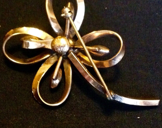 Storewide 25% Off SALE Vintage 12k Gold Four Leaf Clover Designer Brooch Featuring Beautiful Prong Set Clear Rhinestones With Elegant Curvat