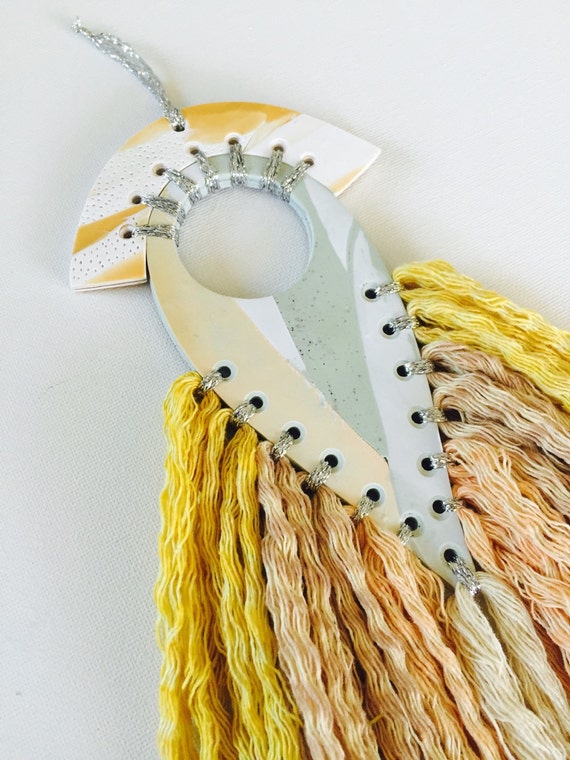 Mini polymer clay wall art with cotton tassels