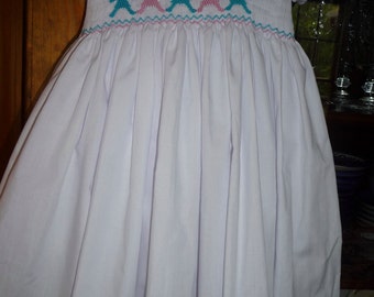 Hand smocked paper dolls