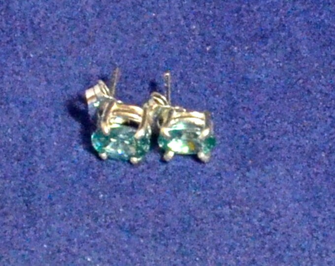 Blue Zircon Studs, 7x5mm Oval, Natural, Set in Sterling Silver E953