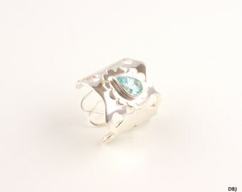 Silver ring with Topaz