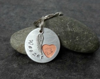 Personalized Pet Memorial Keychain - Paw Print inside heart- Custom made with pet's name, hand stamped on metal with angel wing charm -