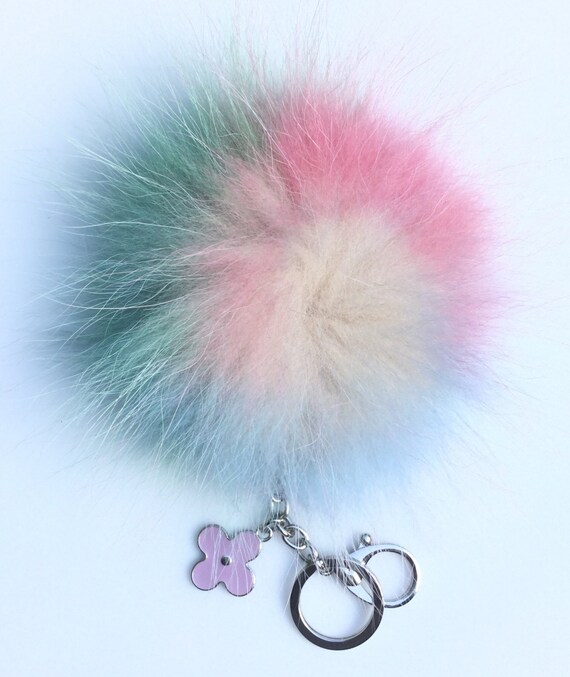 NEW Collection Dimensional Swirl™ Multi Color Raccoon Fur Pom