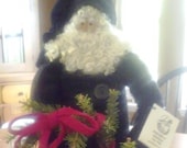 Primitive one of a kind Santa that was handmade in the USA.