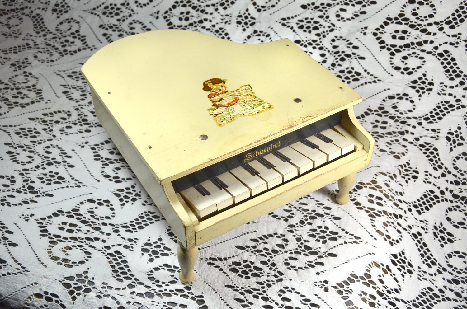 vintage wooden toy piano