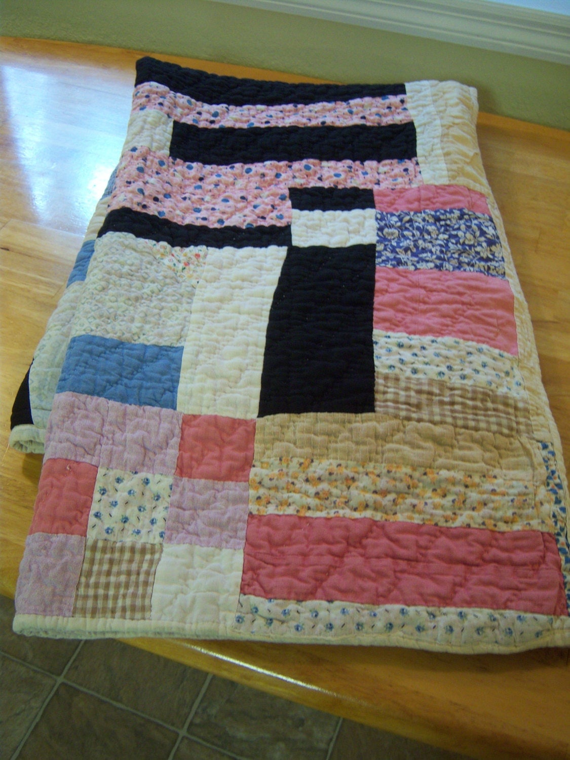Antique hand stitched quilt with random design/Heavy cotton