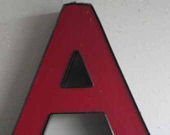 Channel Sign Letter Capital 'A' in red/purple with Black Trim