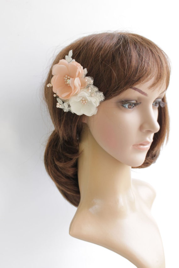 Items similar to light peach ivory bridal hair flower, weddings