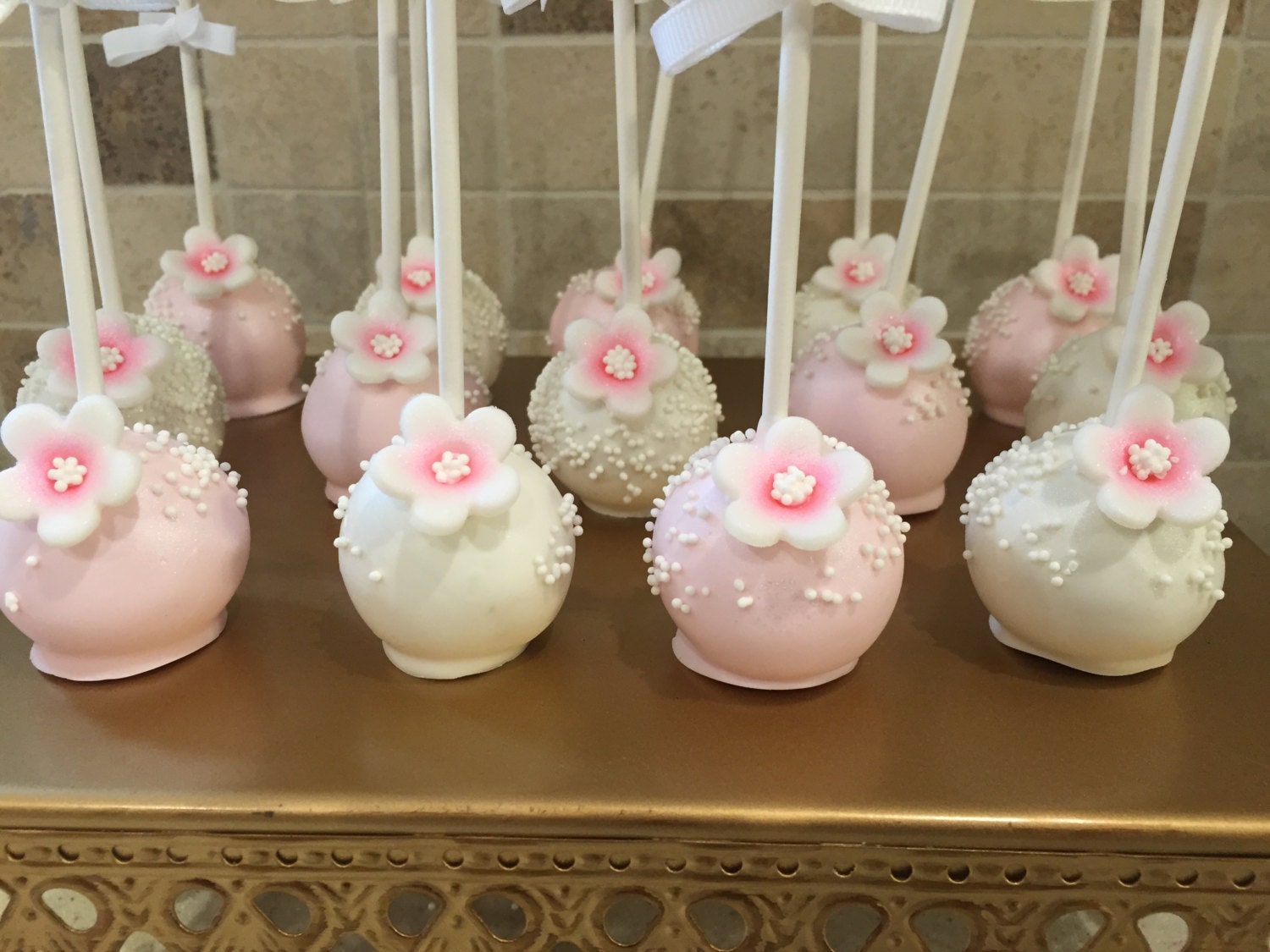 Chocolate Covered Cake Pops with Edible Flower and Sprinkles