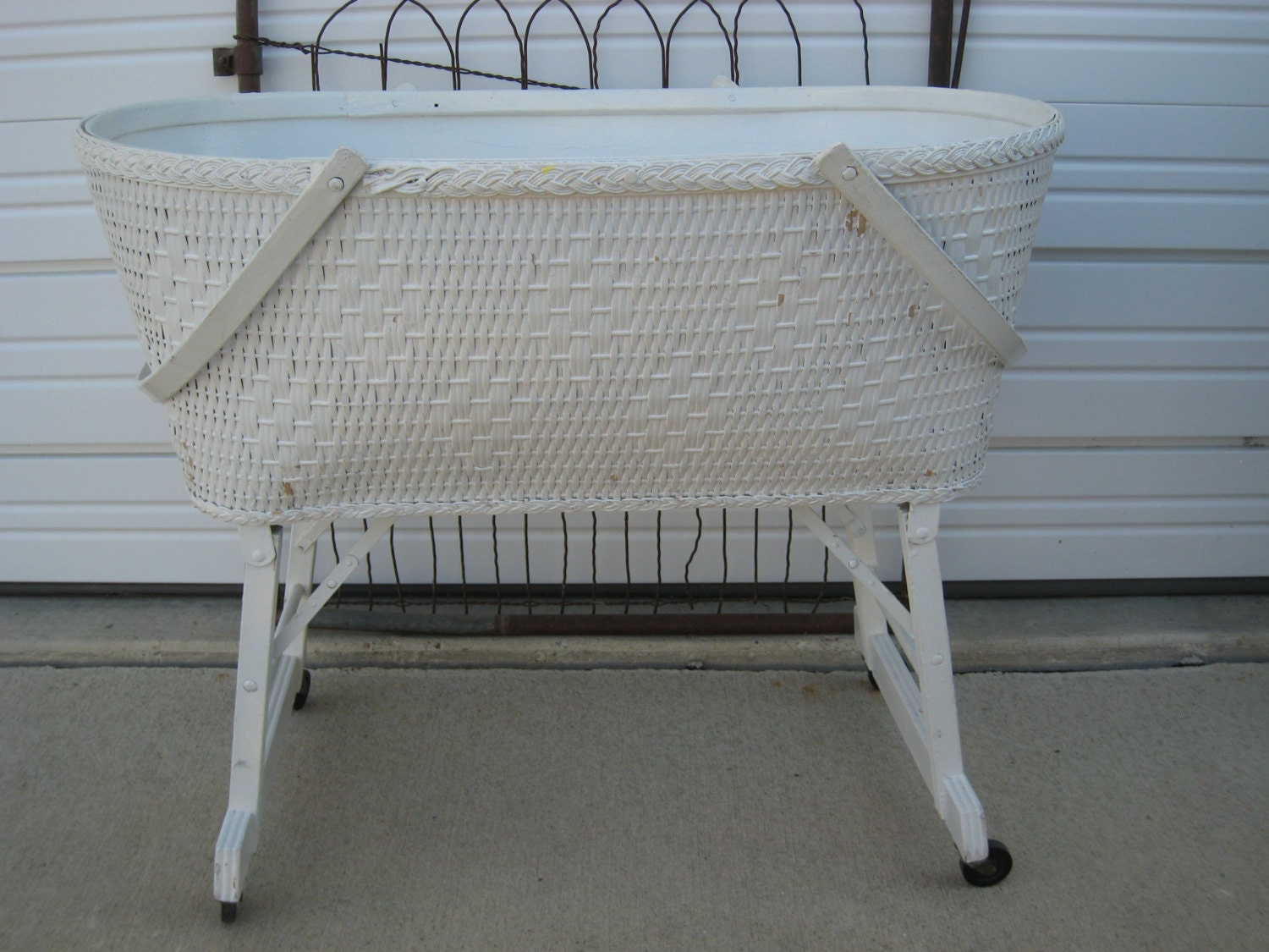 Vintage White Wicker Baby Cradle with Fold Down Legs on