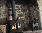 Photographic greetings card of the inglenook fireplace in a C16th English cottage