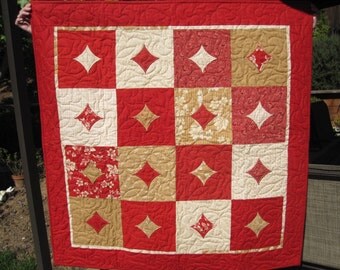 Red and Tan Bandana Print Cathedral Window Quilt