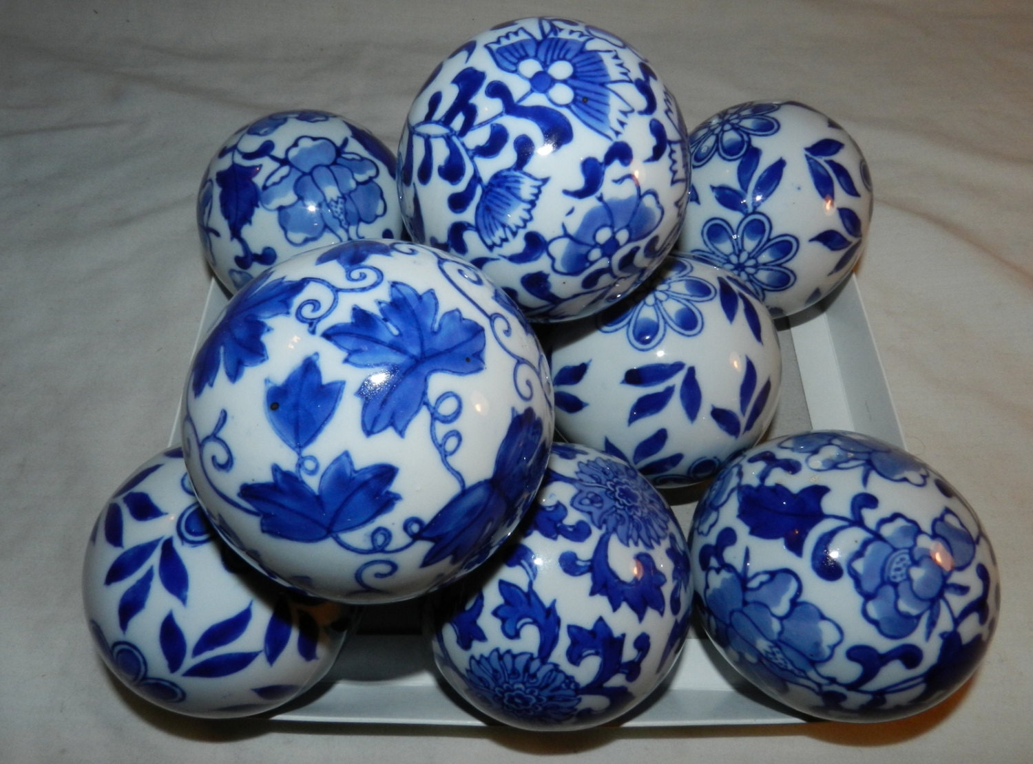 Lot of 9 Cobalt Blue and white decorative carpet balls for