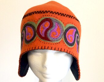 Hand made felted hat, unique design, orange, embroidered.