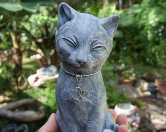 black cat outdoor statue