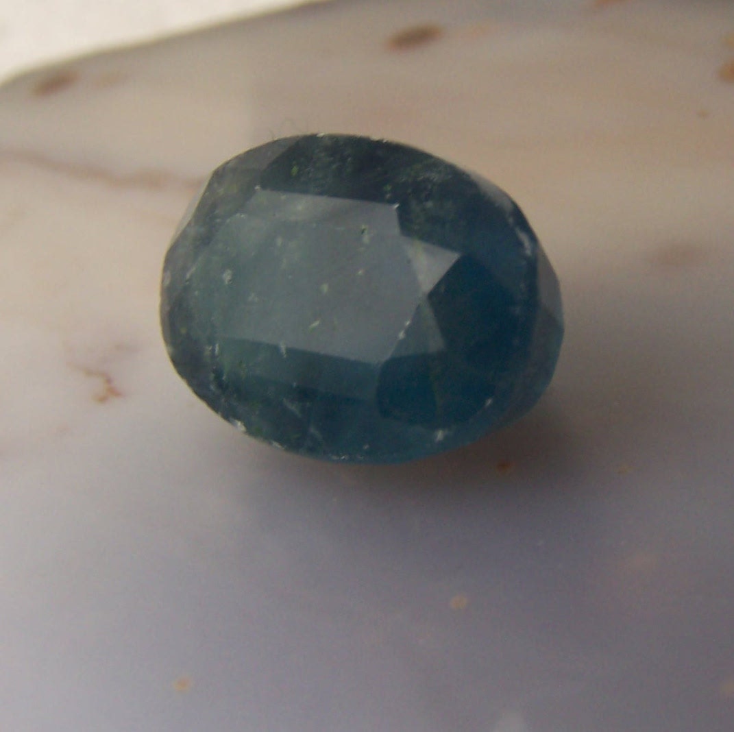 Blue Fluorite Gemstone faceted from natural crystal teal