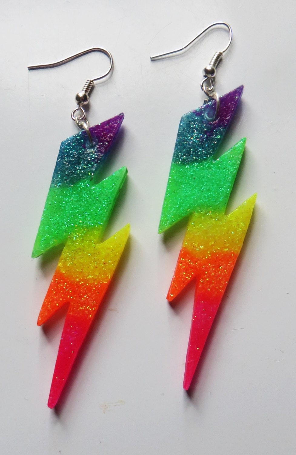 Neon rainbow glitter lightning flash earrings by ToxicGlamour