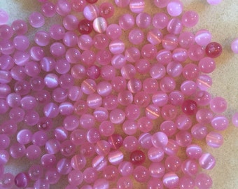 50 x pink cats eye beads