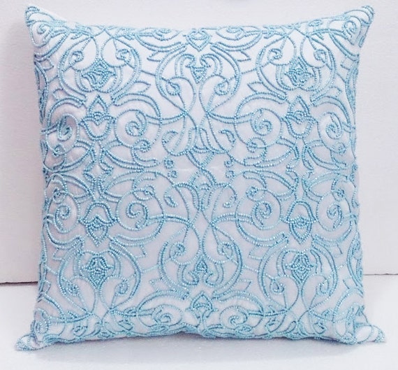 white decorative pillow