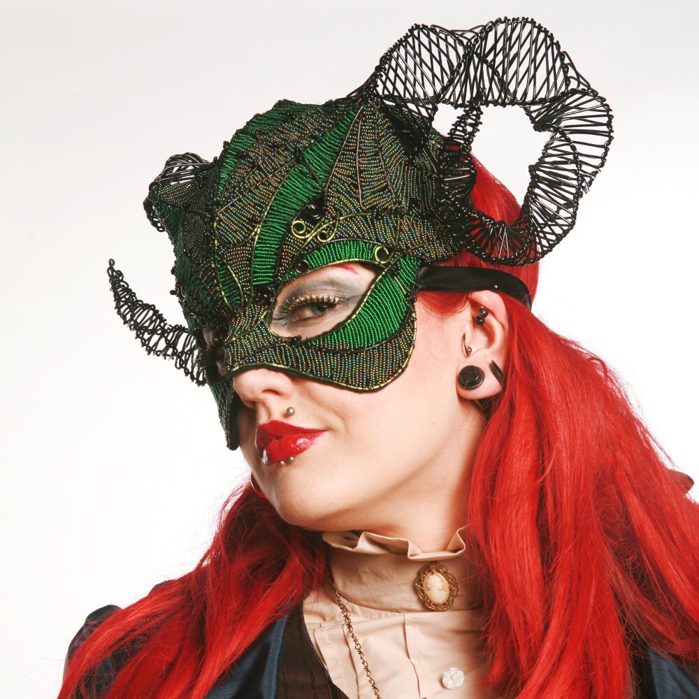 Green and black horned masquerade ball by gringrimaceandsqueak