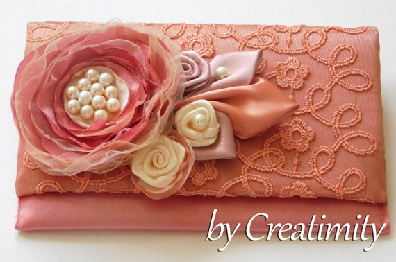 salmon pink clutch bag