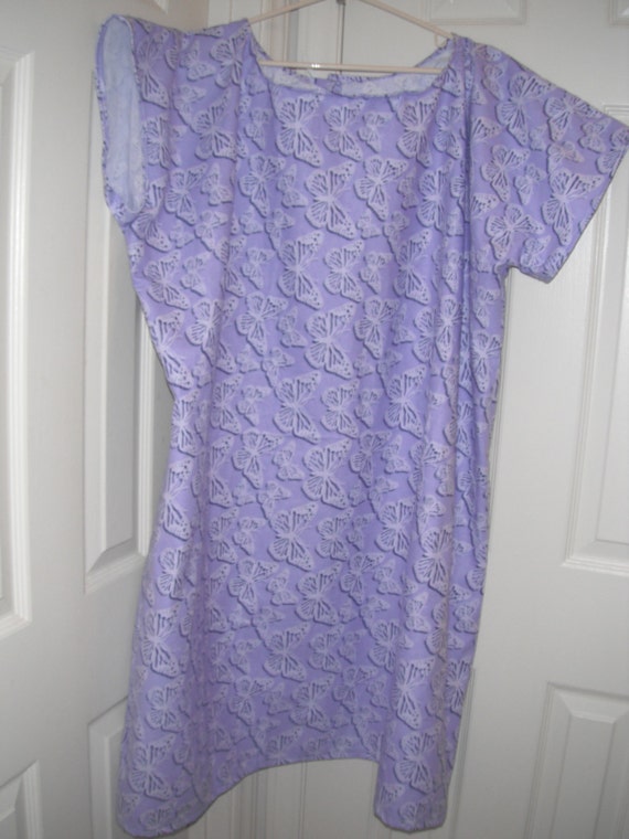 Lacy butterflies on purple flannel hospital gown