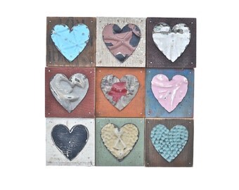 9 primitive hearts mixed media assemblage by Elizabeth Rosen