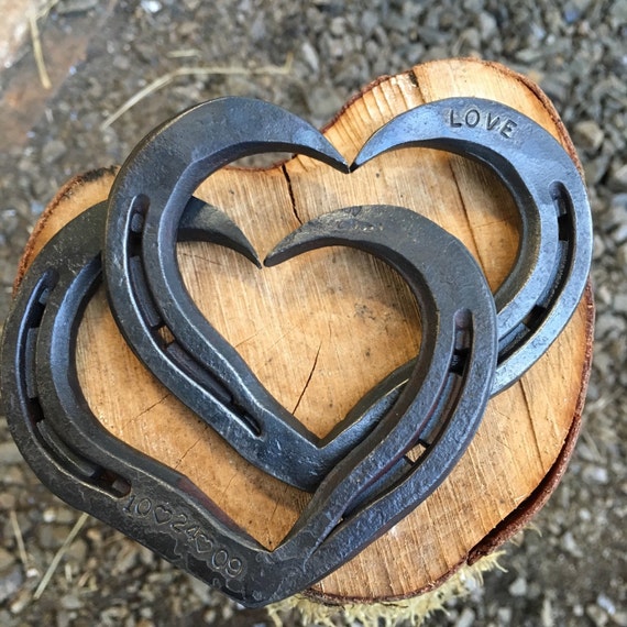 Horseshoe Heart Little interlocking horseshoe hearts.