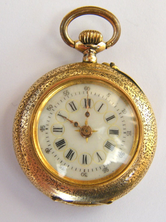 Antique-14 carat Gold Ornately Engraved Ladies Pocket Watch