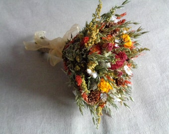 Autumn country woodland bridal wedding bouquet with orange and reds dried flower wedding bouquet