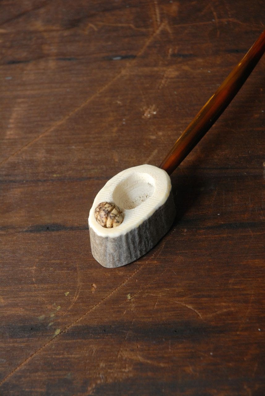 Elk Antler Pipe with a brown bead