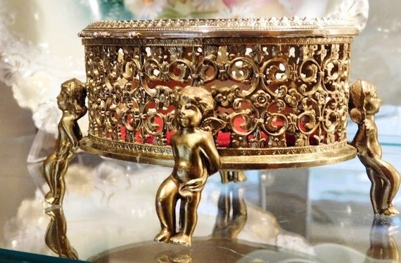 1940s Jewelry Casket Box Hollywood Regency Cherubs Filigree Ormolu Red Velvet Beveled Crystal 24 Karat Gold Plated Oval Box Vanity Boudoir