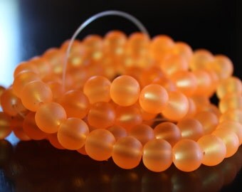 100 approx. 8 mm light orange frosted glass beads, round and smooth, one strand for making jewelry
