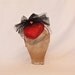 Handmade red heart shaped ladies hat with black tulle bow and veiling handmade in Yorkshire by Jacqueline Walker Millinery Handmade red heart shaped ladies hat with black tulle bow and veiling